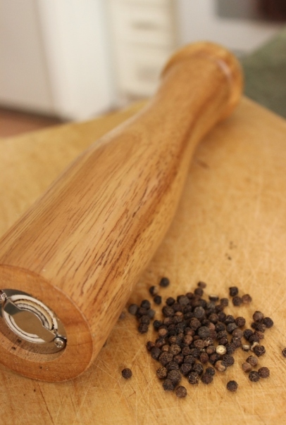 Pepper mill with black peppercorns