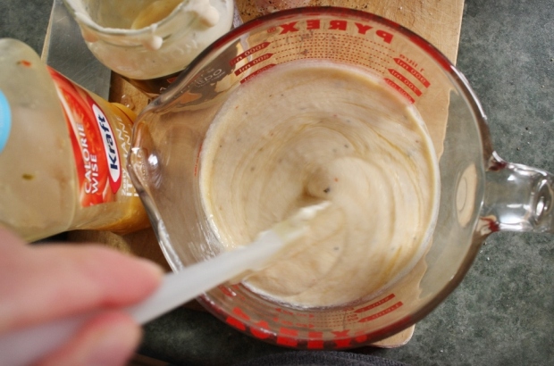 Mixing secret sauce for Crock Pot Alfredo Chicken